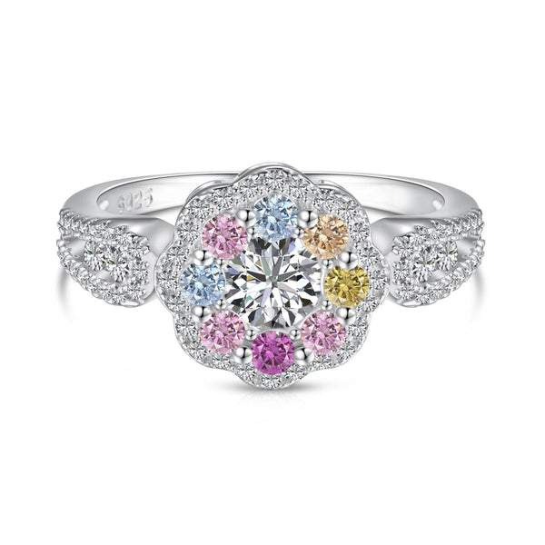 <oriell> Zarter, farbenfroher Ehering in Blumenform mit rundem Schliff</oriell>
